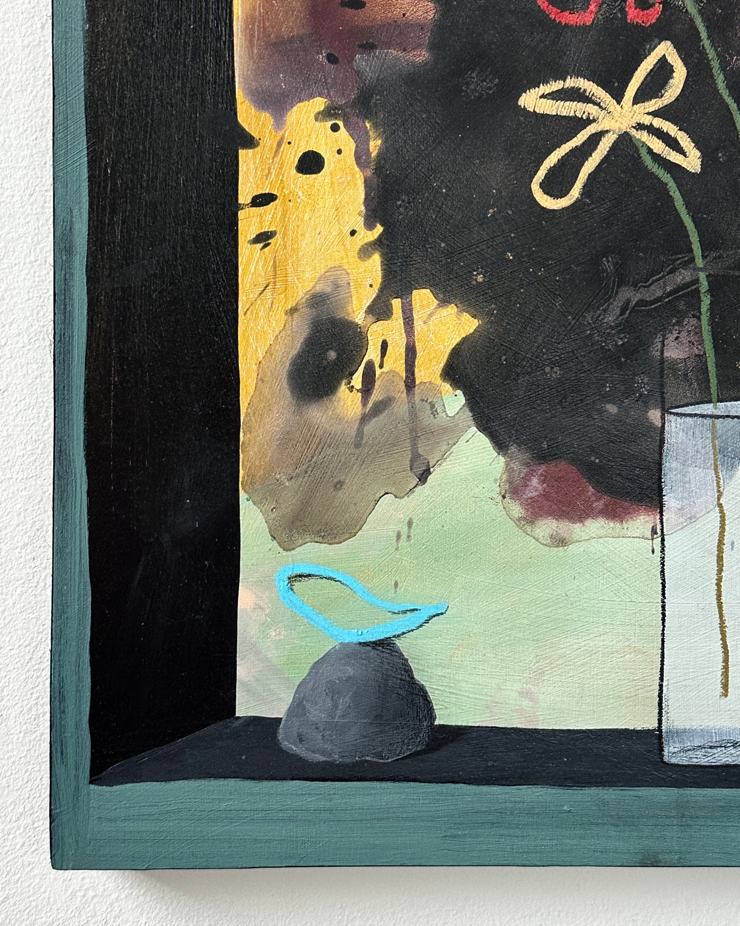 Plastic flowers in a glass with milk (witch gift)
