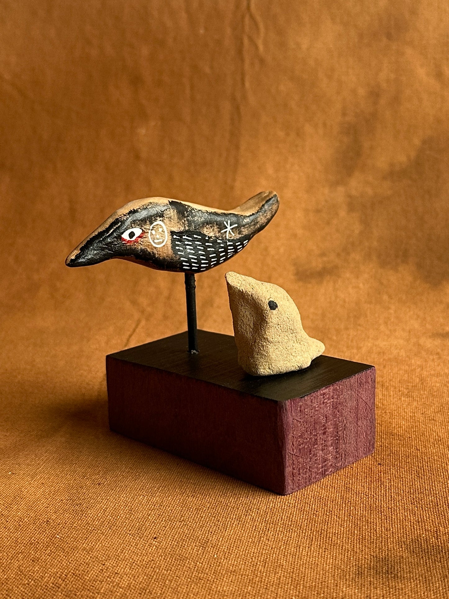 Ash pile stalker (adult and nestling)