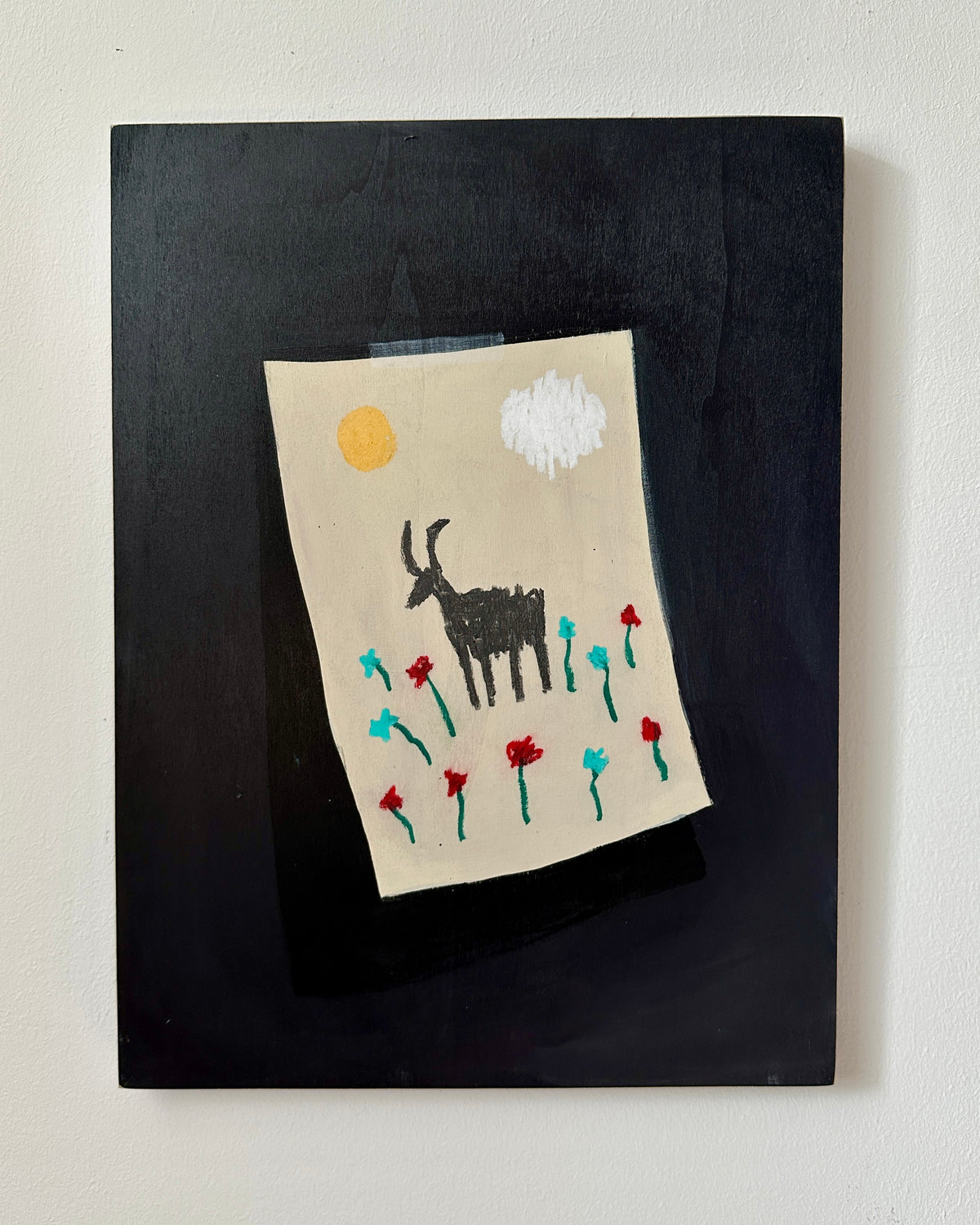 A painting of a drawing of a magical goat.