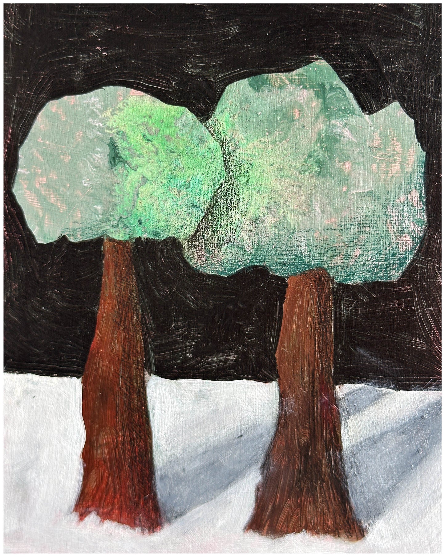 Two trees with nowhere else to grow.