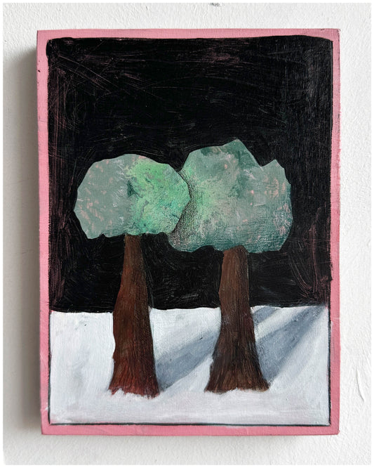Two trees with nowhere else to grow.